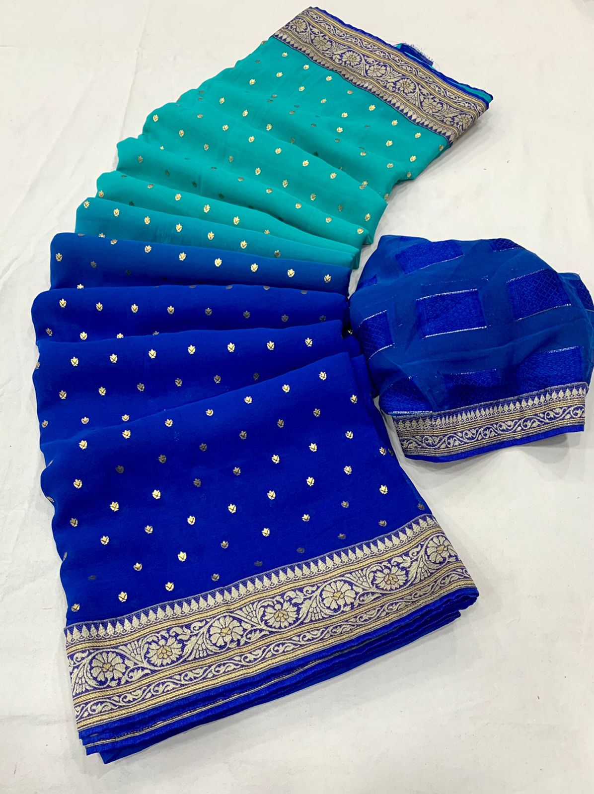 Stavan Brahmastra New Fancy Exclusive Wear Georgette With Foil Print Saree Collection 